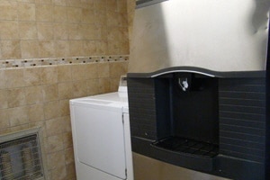 Ice machine and laundry amenities at Oak Square Condominiums